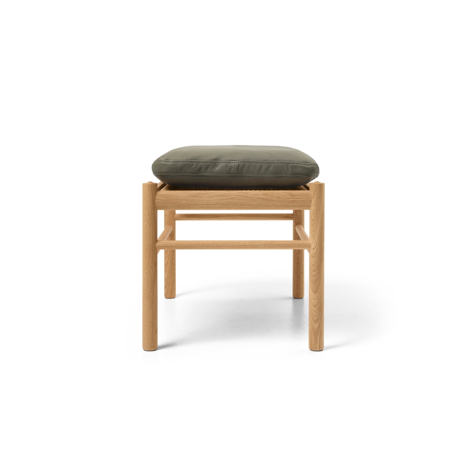 Wood stool with green leather cushion