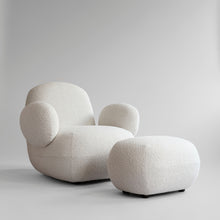 Modern armchair with matching ottoman 
