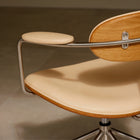 Office chair with wooden backrest and beige leather seat 