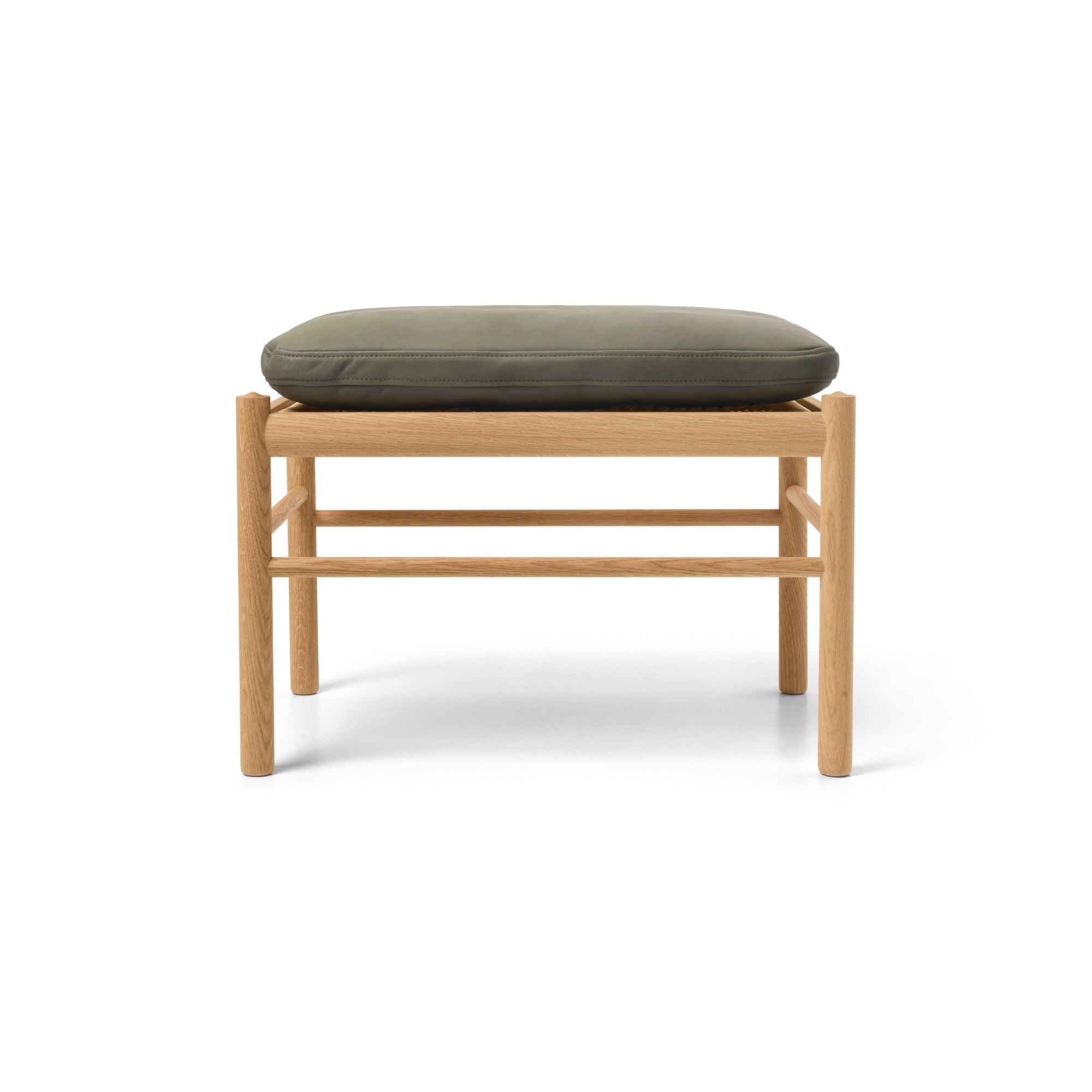 Wooden stool with a green cushion 