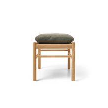 Wood stool with green leather cushion 