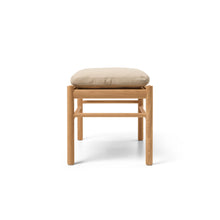 Wood stool with beige leather cushion 