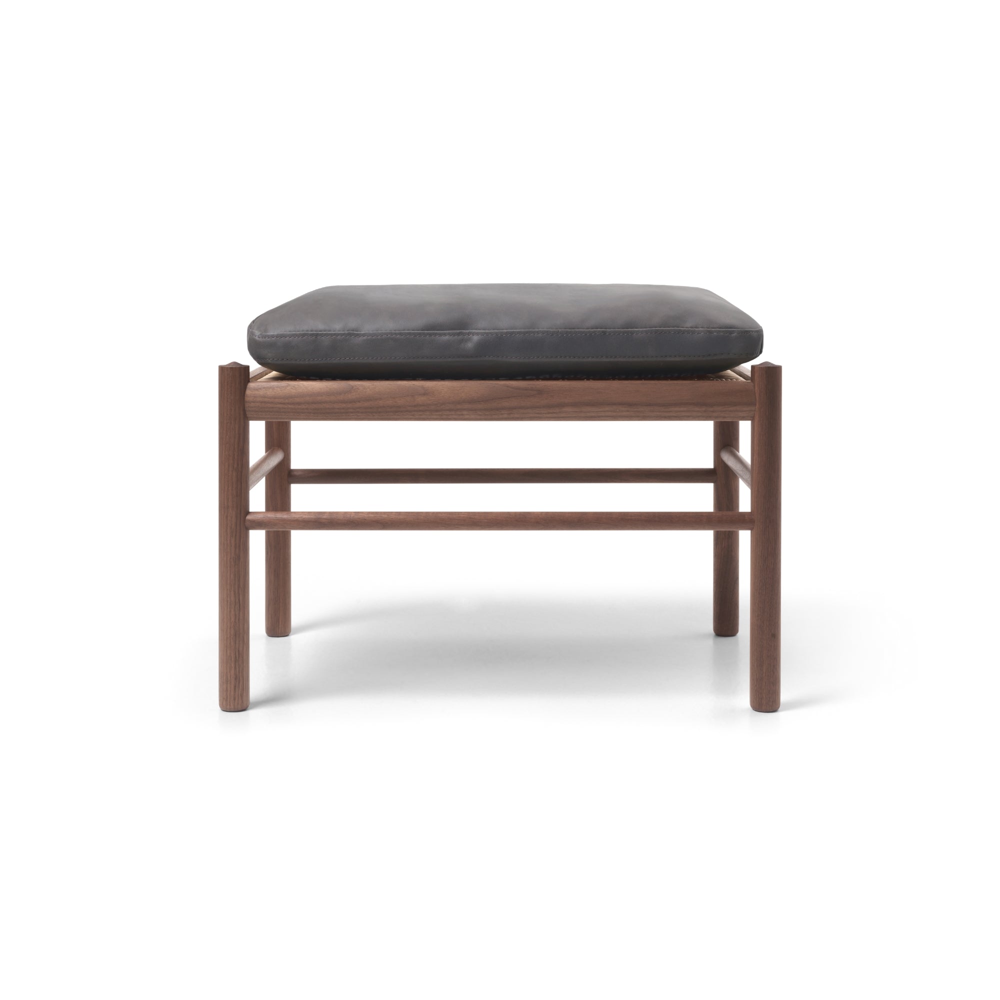 Wooden stool with a gray cushion