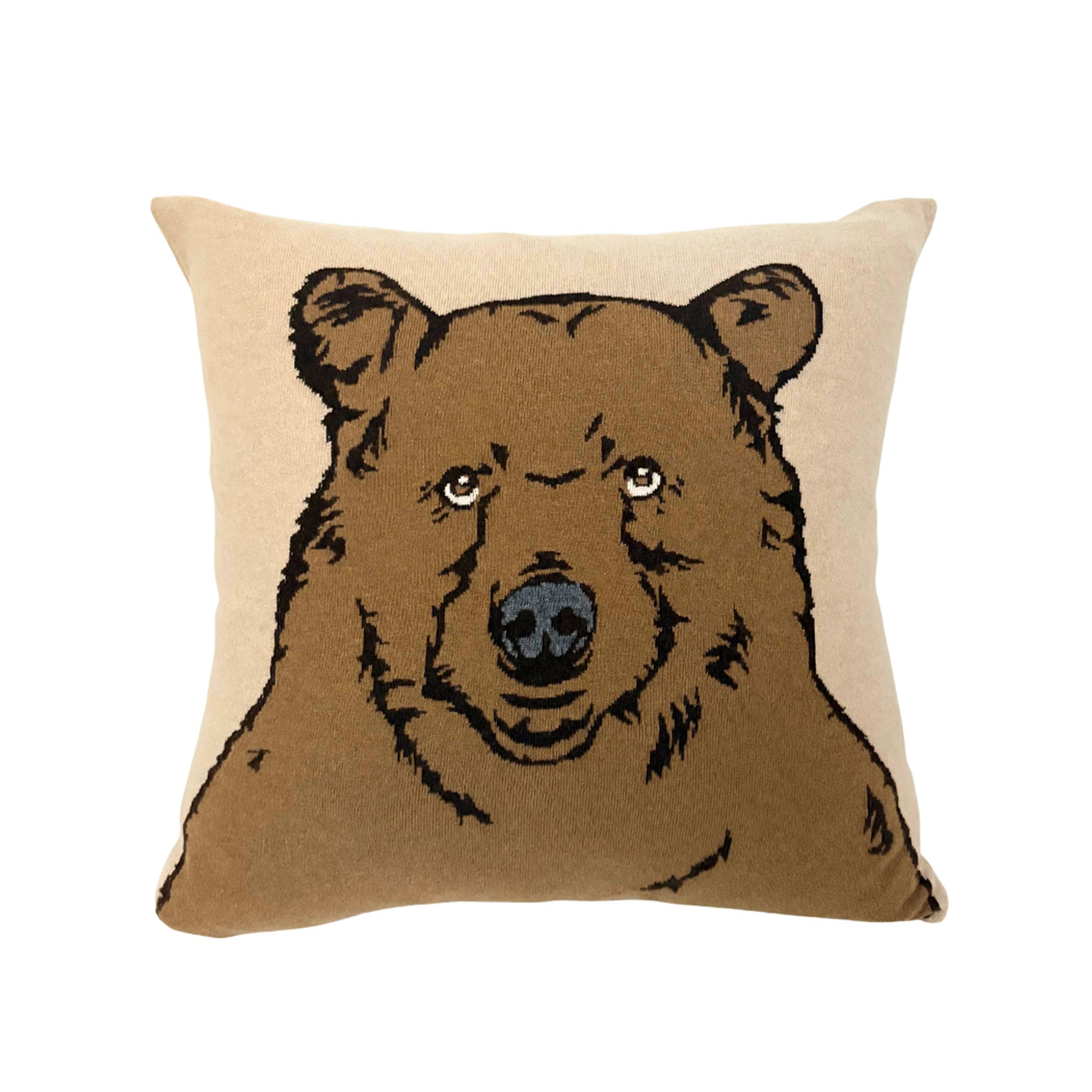 Pillow with a bear design on a beige background