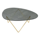 Round glass coffee table with brass legs 