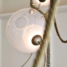 Larose Guyon Abysse 05 – Glass Sphere Chandelier